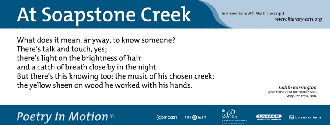 A white poster features the poem At Soapstone Creek by Judith Barrington. The poster is bordered by blue on the top and bottom.